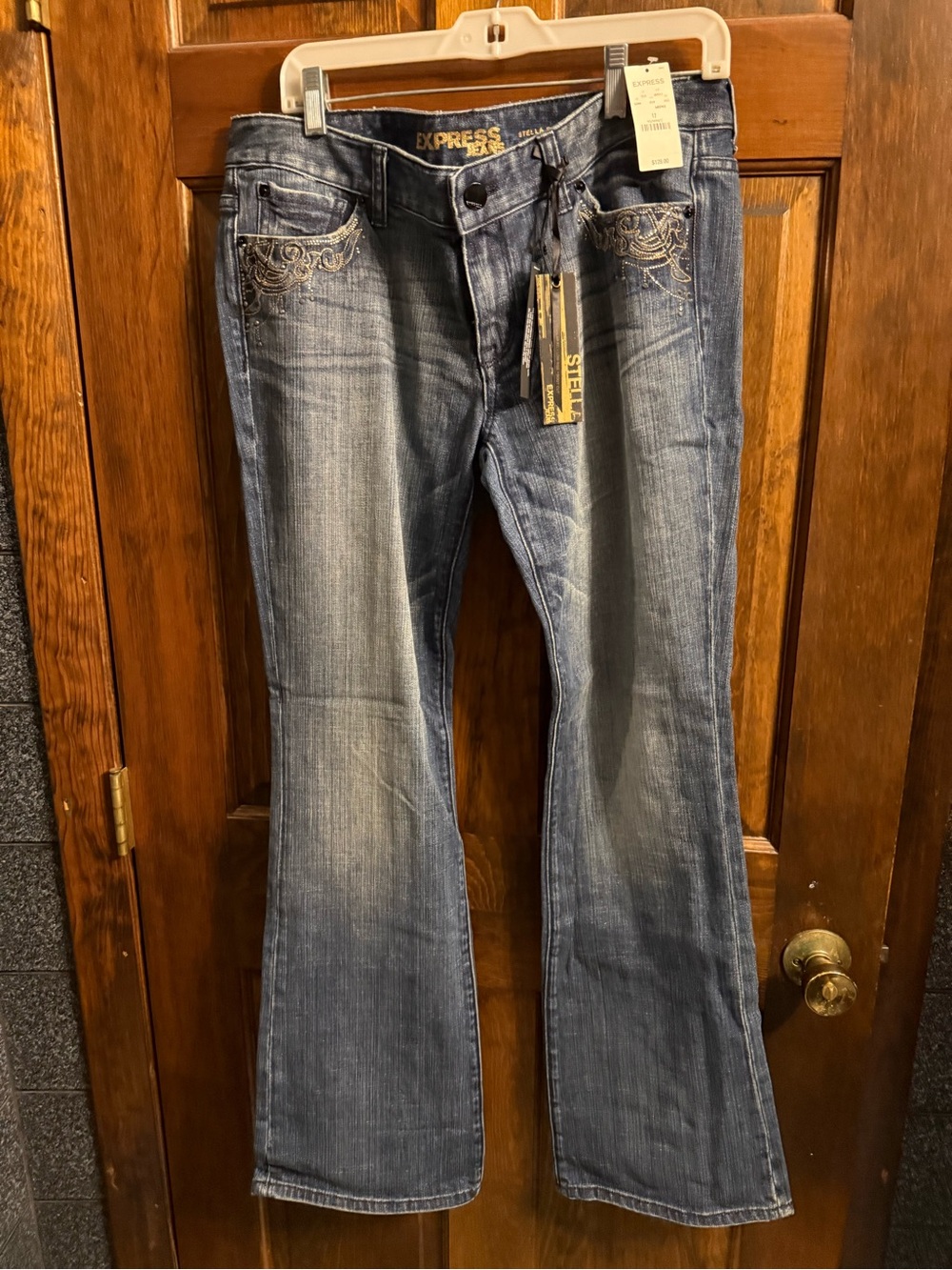 Express Women's Medium Blue Flared Jeans with Embroidered Pockets